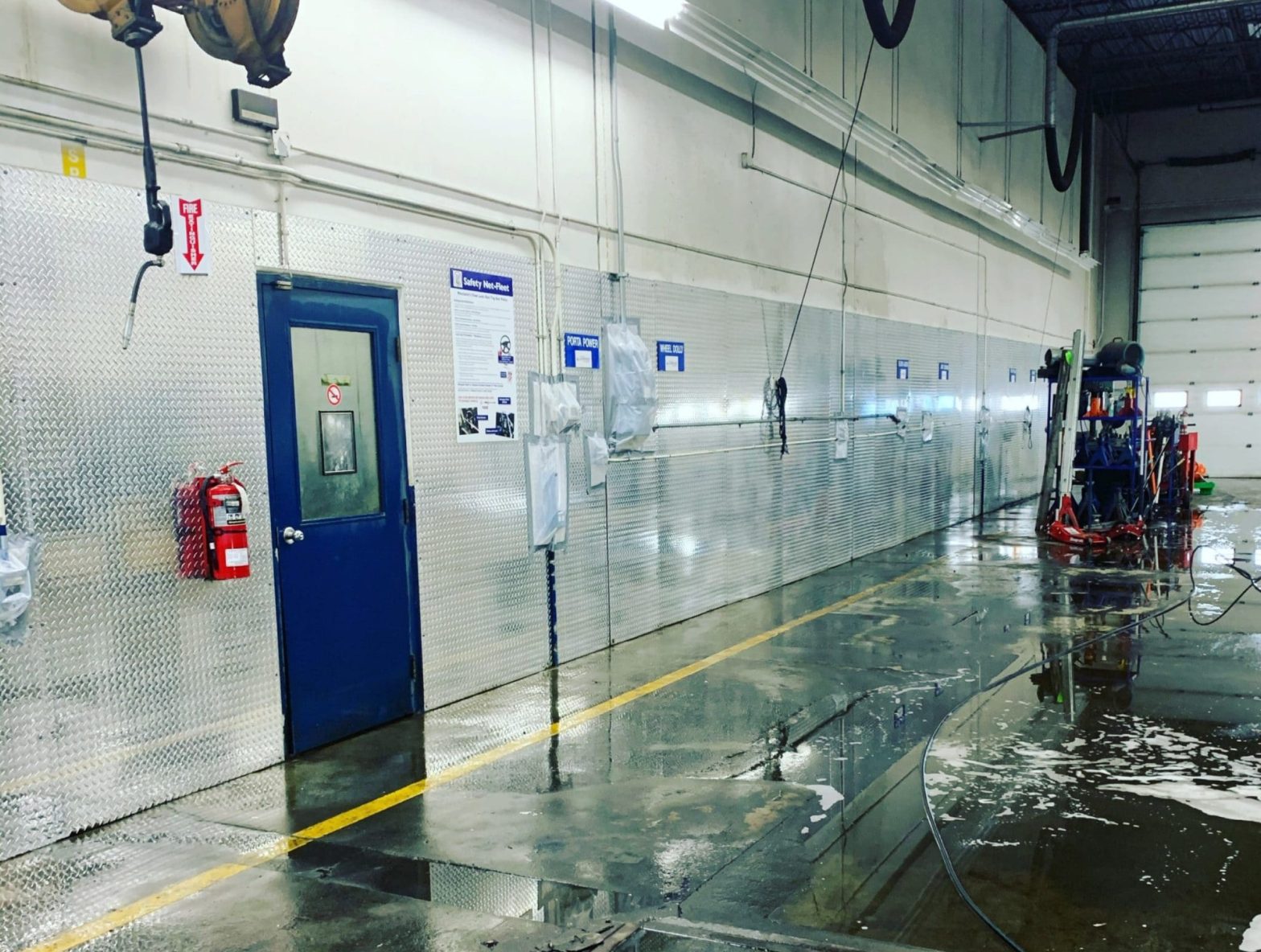 commercial pressure washing a warehouse